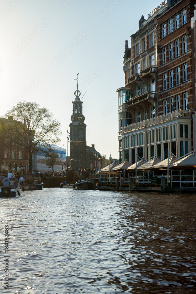 Canal views on Munttoren tower in Amsterdam, Netherlands, October 13, 2017