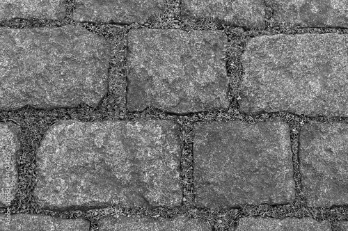 monochrome grunge background gray stone part of a stone canvas tile urban pattern