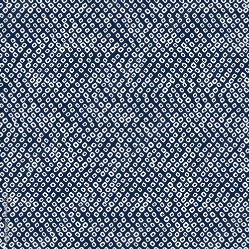 Japanese Shibori ornament. Asian seamless pattern. Weaving motif. Dark background. Classic japanese dyeing technique. Plain backdrop for decoration, wallpaper or web page background. photo