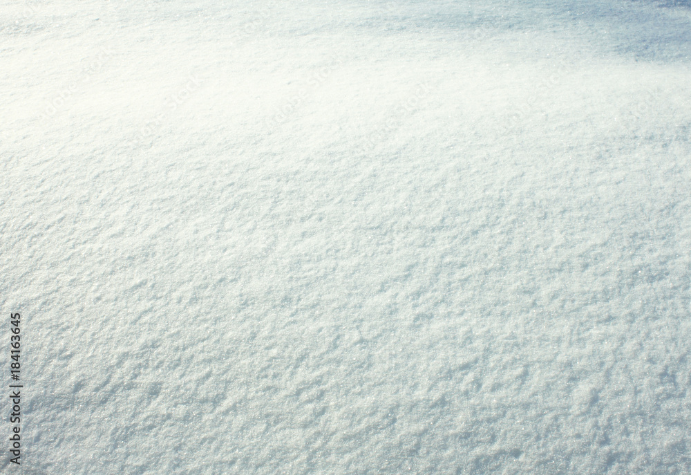 natural snow background with beautiful blue shining snow for a Christmas or New Year's greeting card natural snow background with beautiful blue shining snow for a Christmas or New Year's greeting card