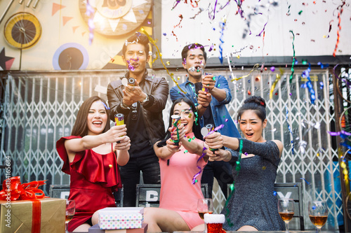 Canvas Print Happy friends greeting in New year party and celebrating birthday gift concept