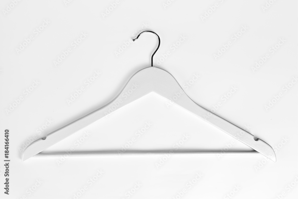 Wooden hangers for clothes on a white background. Wooden hangers for clothes on a white background.