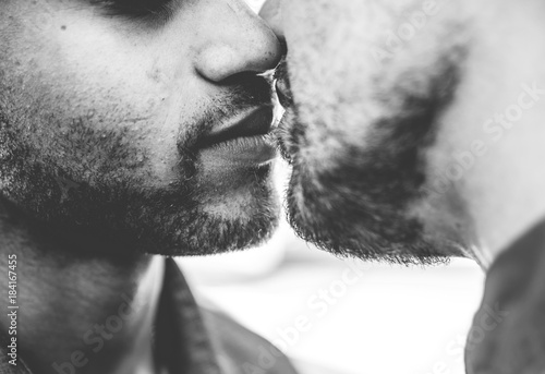 Close up couple kissing each other photo