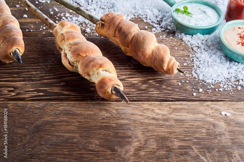 Crusty fresh twist bread at a winter barbecue photo