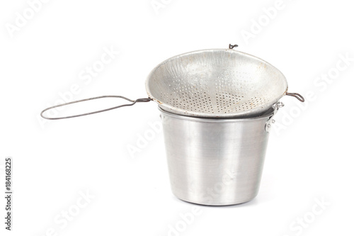 Old and dirty colander with aluminum bucket  isolated on white background