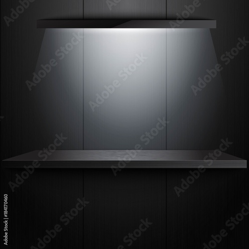 Black empty shelf with light. Product presentation. 