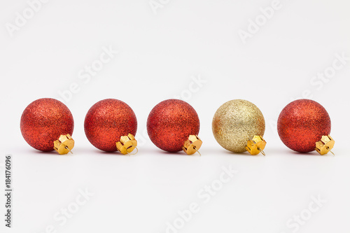 Red and gold Christmas decoration on the white desk