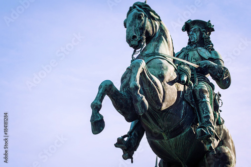 Statue of Prince Eugene of Savoy against the blue sky at Heldenplatz (German: Heroes' Square). Closeup veiw. Public space in front of the Hofburg Palace in Vienna, Austria photo