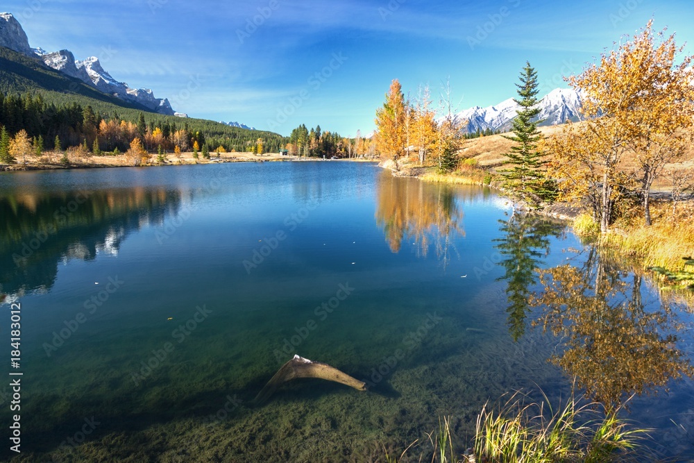 Autumn Landscape and Distant Mountain Tops from Quarry Lake above Canmore in Alberta Foothills near Banff National Park Canada