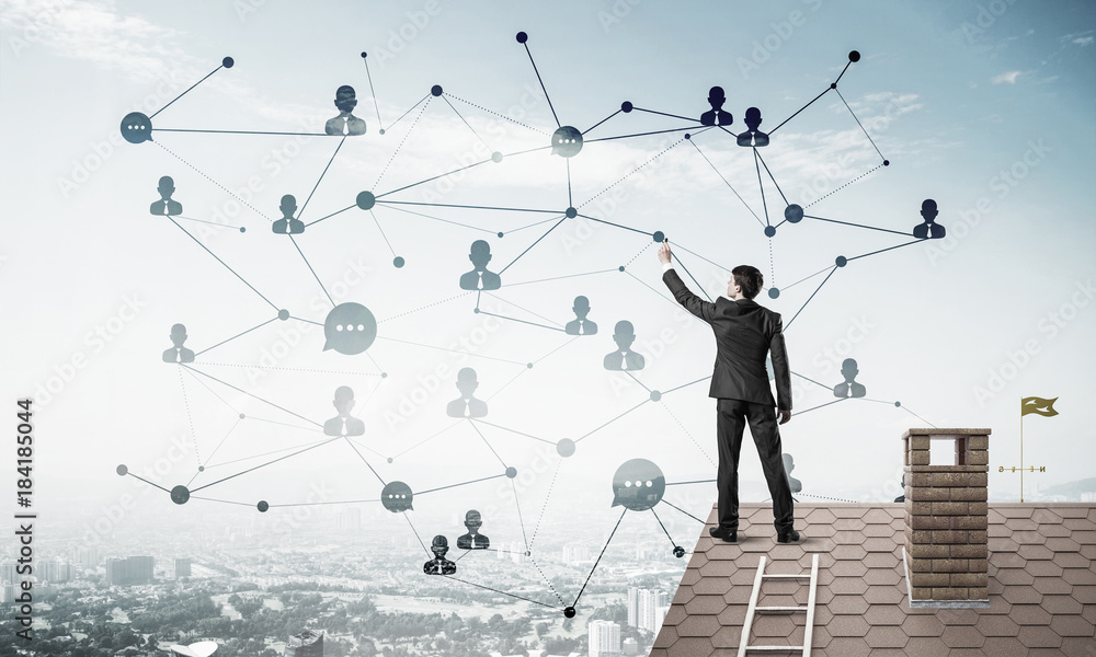 Businessman on house roof presenting networking and connection c Businessman on house roof presenting networking and connection c