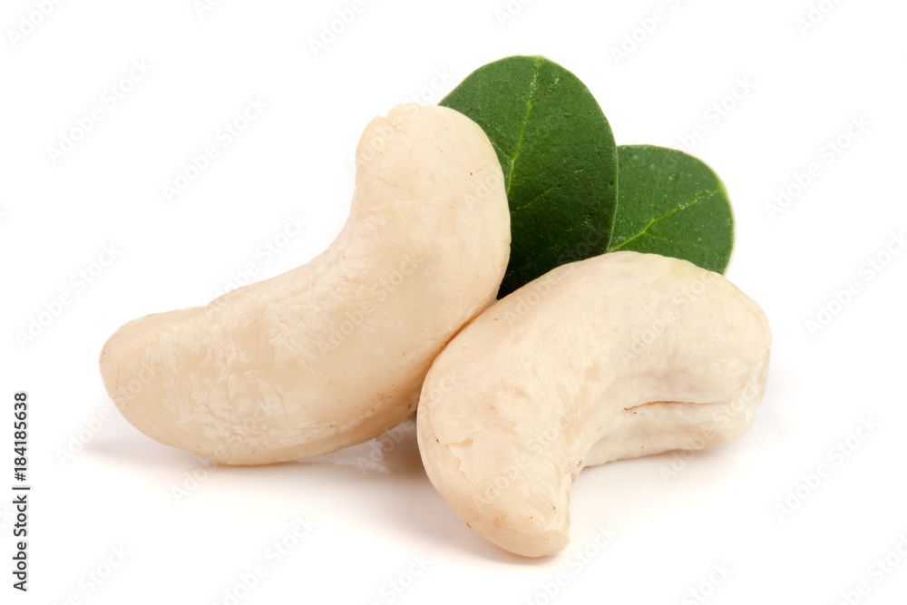 cashew nuts with leaf isolated on white background. macro cashew nuts with leaf isolated on white background. macro
