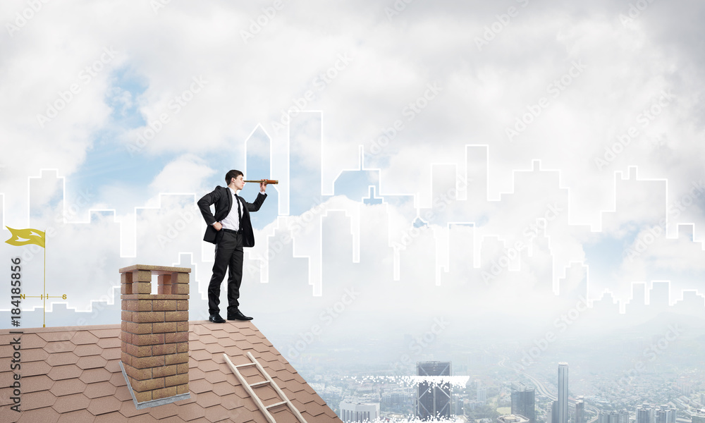 Engineer man standing on roof and looking in spyglass. Mixed media Engineer man standing on roof and looking in spyglass. Mixed media