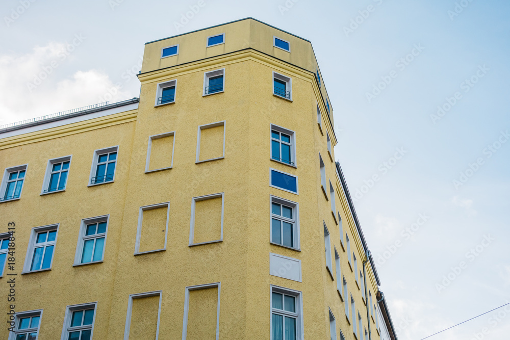 yellow apartment building in berlin
