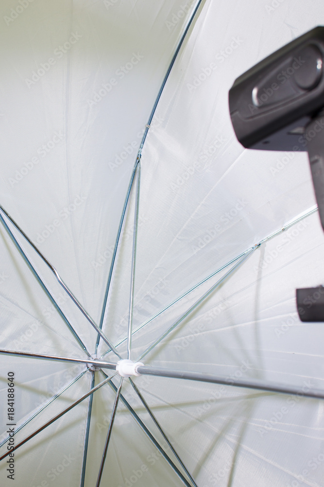 the white umbrella of the photographer from the inside