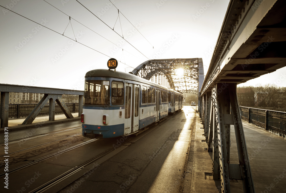 Obraz premium Old Tram on the bridge in Krakow city, Poland