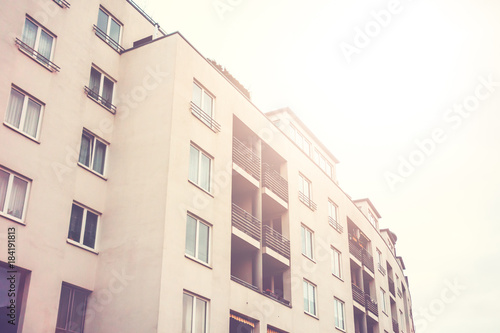 white big apartment block in warm sunlight
