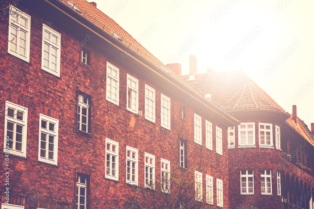 vintage colored picture of brick building in warm sunlight