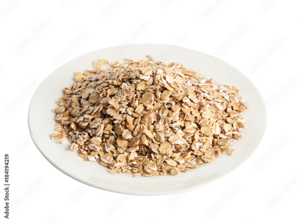 Plate with oat flakes high angle of view isolated on white Plate with oat flakes high angle of view isolated on white