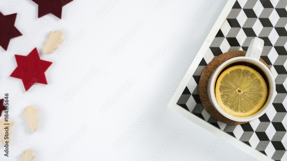 Simple minimalistic flat lay christmas scene with tea Simple minimalistic flat lay christmas scene with tea