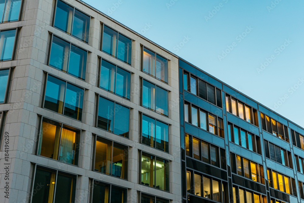 Obraz premium cold colored apartment building with square windows