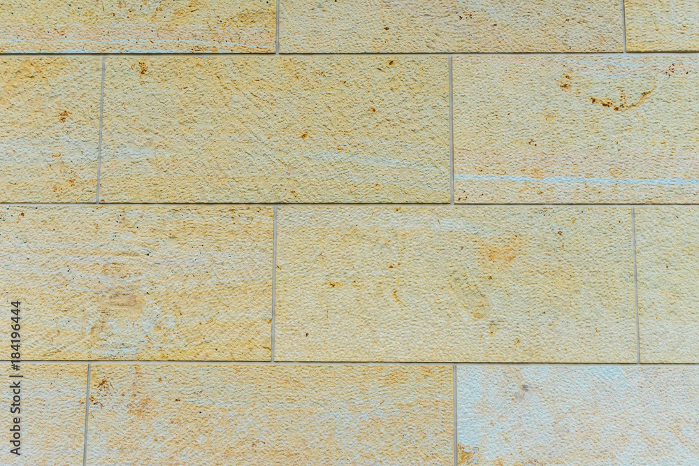 yellow marble block facade as background texture yellow marble block facade as background texture