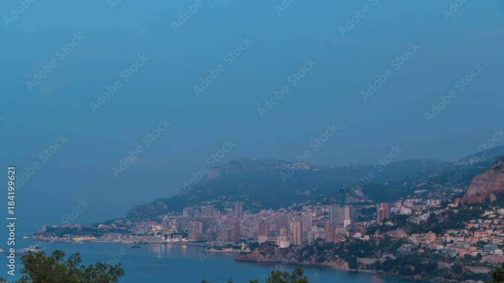 Cityscape of Monte Carlo night to day timelapse, Monaco before summer sunrise. Cityscape of Monte Carlo night to day timelapse, Monaco before summer sunrise.