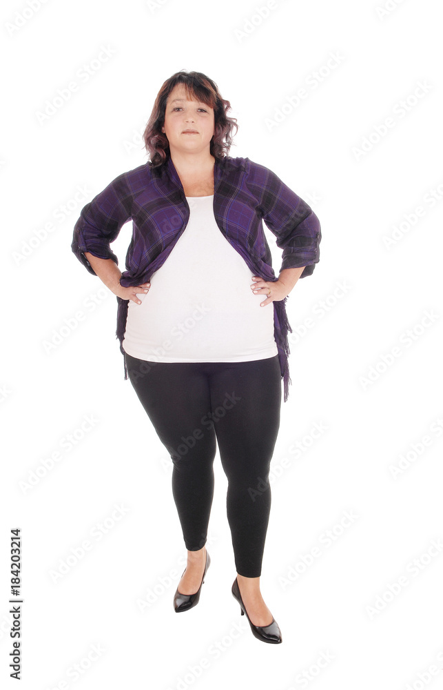 Fototapeta premium Full figured woman standing in tights