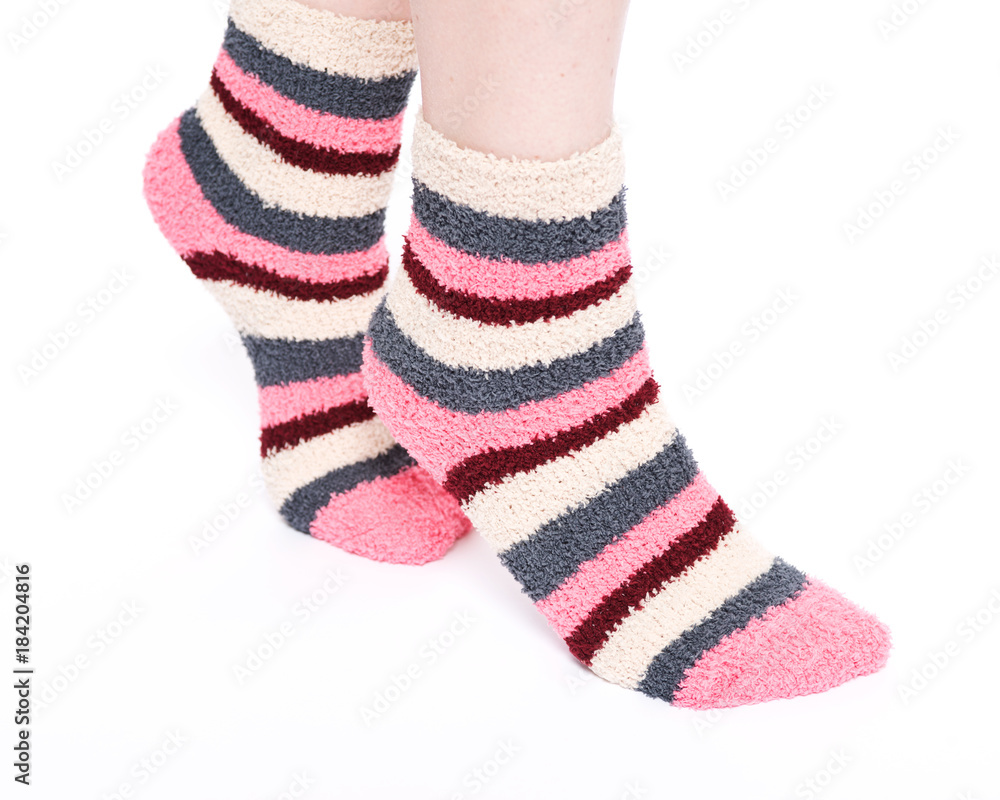 Multicolor women's fuzzy ankle socks with stripes isolated on white background Multicolor women's fuzzy ankle socks with stripes isolated on white background