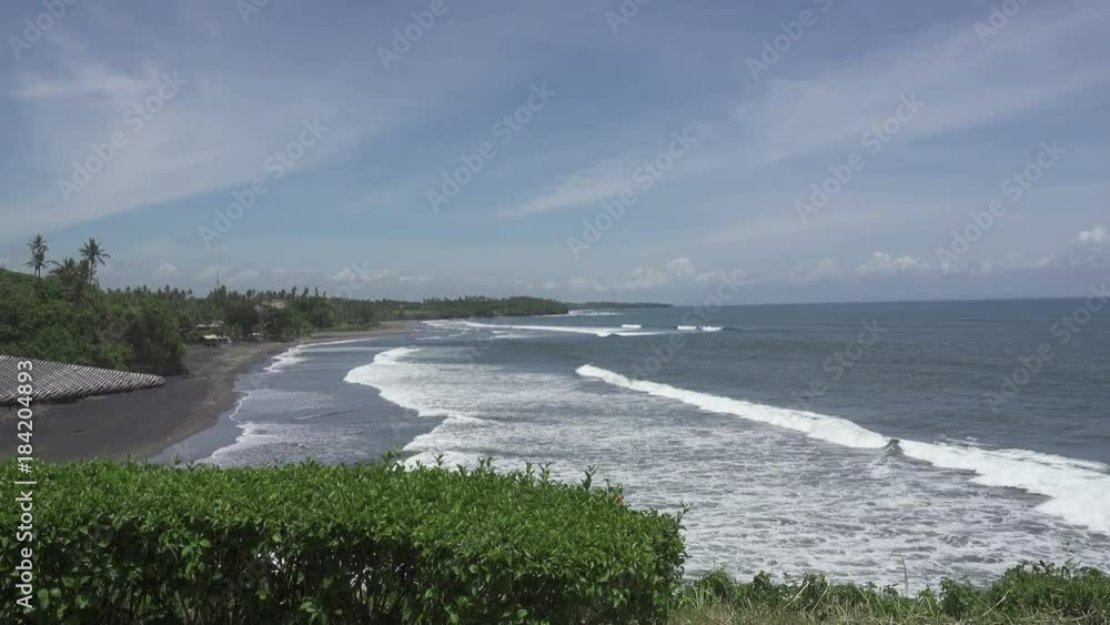 View of the sea, stones and the beach in the area Balian Beach.Bali Indonesia View of the sea, stones and the beach in the area Balian Beach.Bali Indonesia