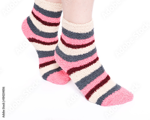 Multicolor women's fuzzy ankle socks with stripes isolated on white background
