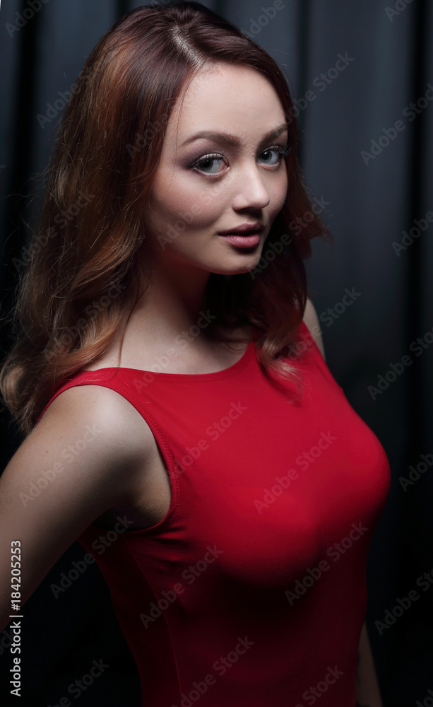 Fashionable young beautiful woman in a red dress Fashionable young beautiful woman in a red dress