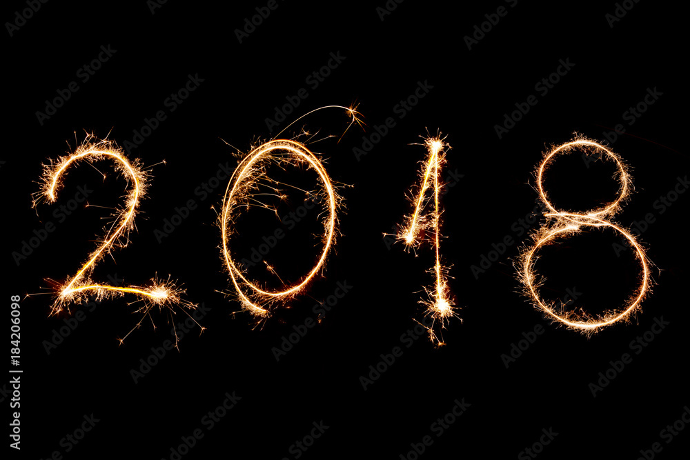2018 written with Sparkle firework on black background, happy new year 2018 concept 2018 written with Sparkle firework on black background, happy new year 2018 concept