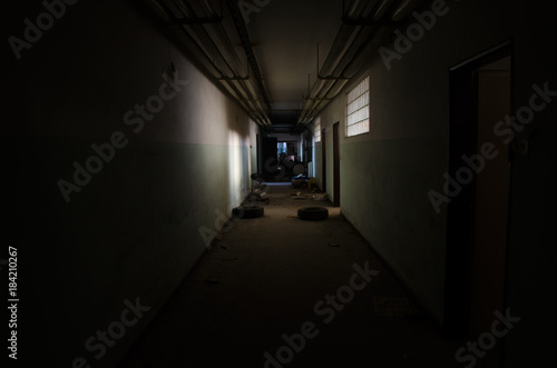 Hallway in abandoned hospital photo
