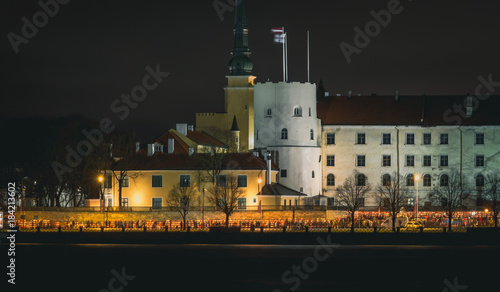 Latvian patriots lighting candles as a tribute to fallen freedom fighters. An annual remembrance day in 11th of November