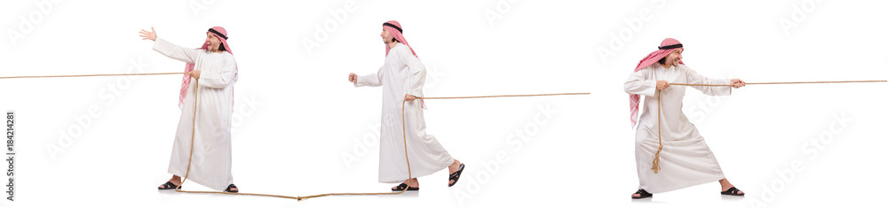 Arab in tug of war concept on white