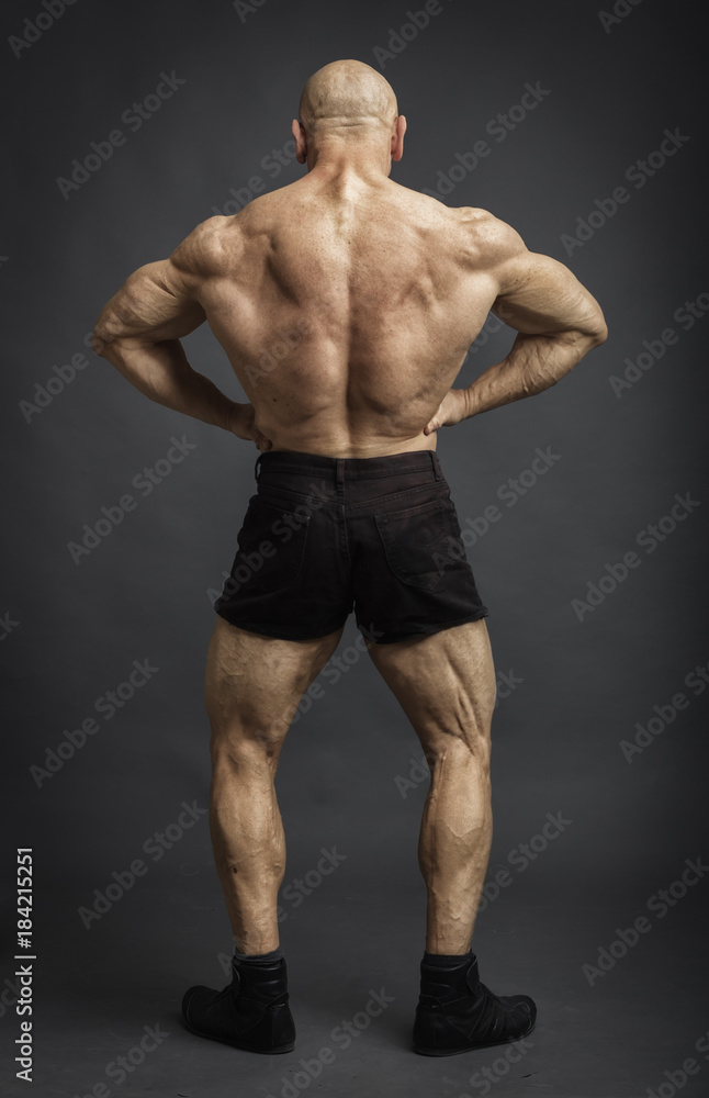 Bodybuilder back pose - AST Sports Science-demhanvico.com.vn