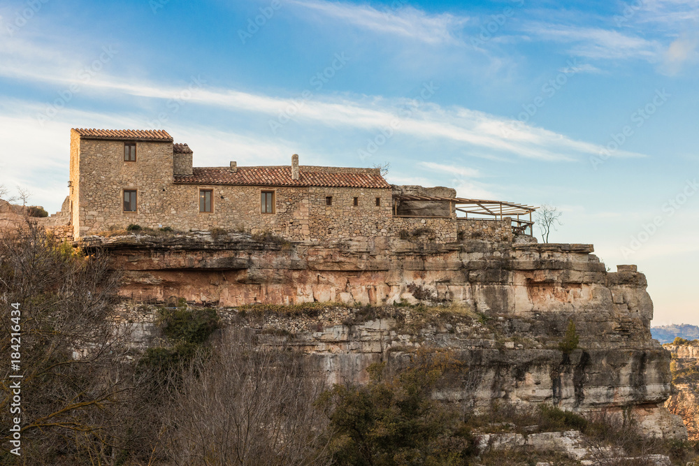 Stone house high on the mountain in Siurana. Beautiful landscape from high peak to climbing climbers and adventurers