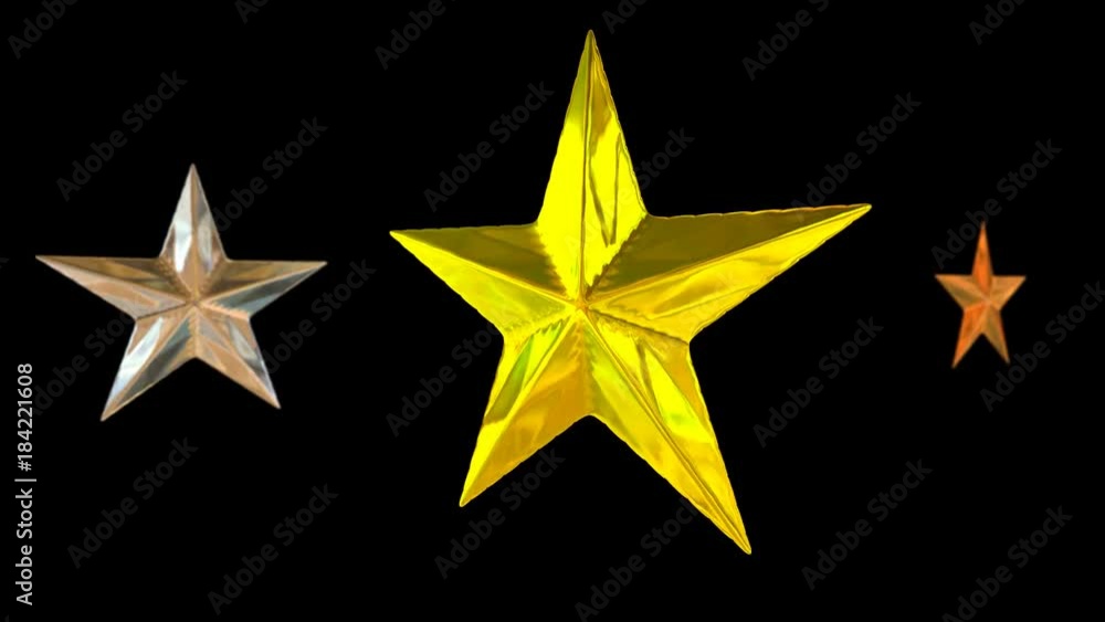 Animated spinning gold, silver and bronze stars against black background in slow motion and with shallow depth of field. Mask included. Loop able and isolated. High reflective surface. Animated spinning gold, silver and bronze stars against black background in slow motion and with shallow depth of field. Mask included. Loop able and isolated. High reflective surface.