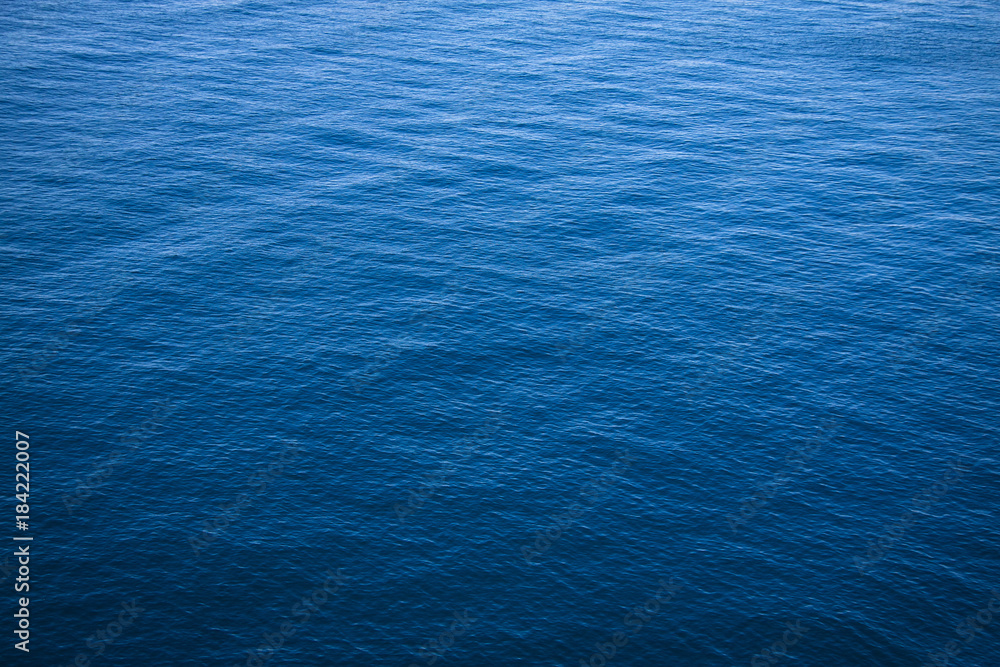 Obraz premium The surface of the blue sea.