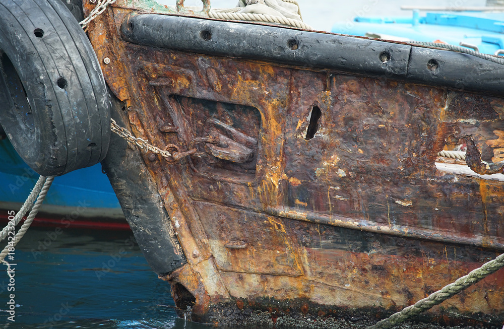 Scene of the ship of rusted iron anchoring in the port Scene of the ship of rusted iron anchoring in the port