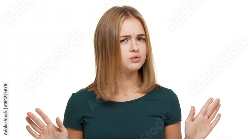 Wallpaper Mural Portrait of frowning woman being firmly determined expressing reluctance waving hands making X shape answering NO over white background in studio. Concept of emotions Torontodigital.ca