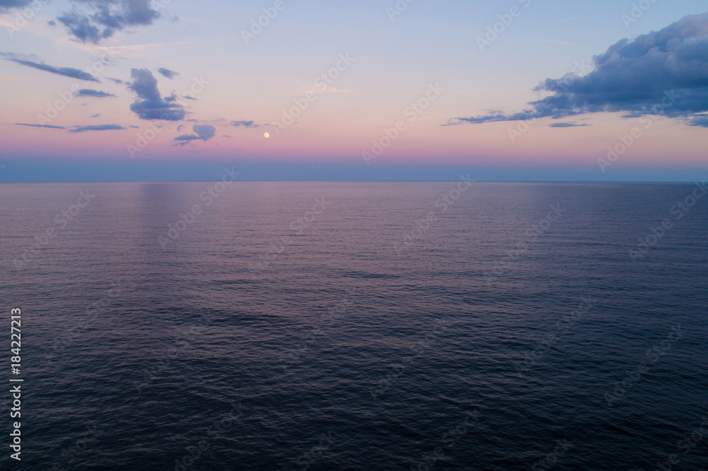 Aerial image moon over the ocean