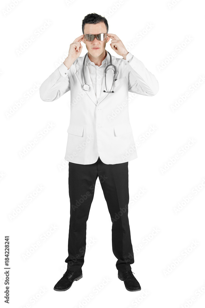 European doctor using futuristic glasses on studio European doctor using futuristic glasses on studio