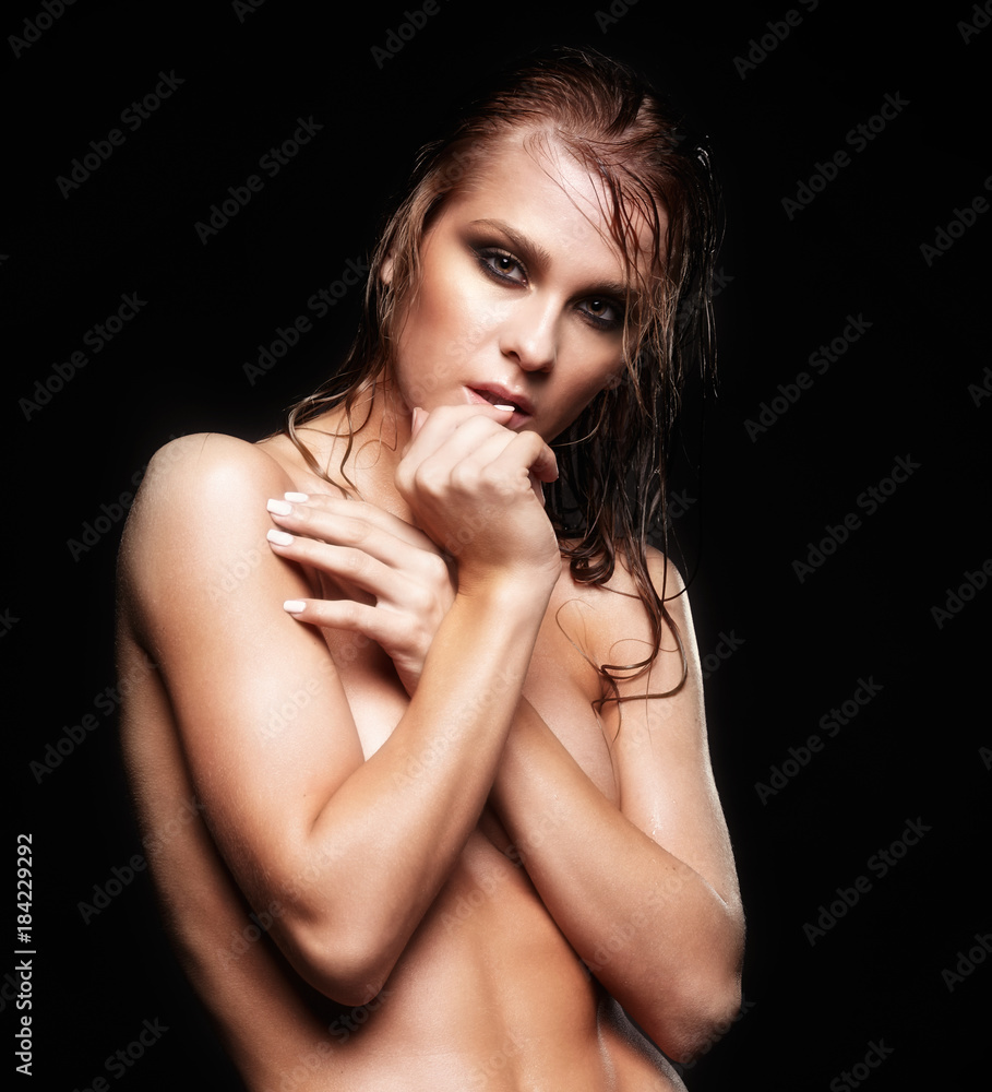 Woman with wet shining makeup on black background Woman with wet shining makeup on black background