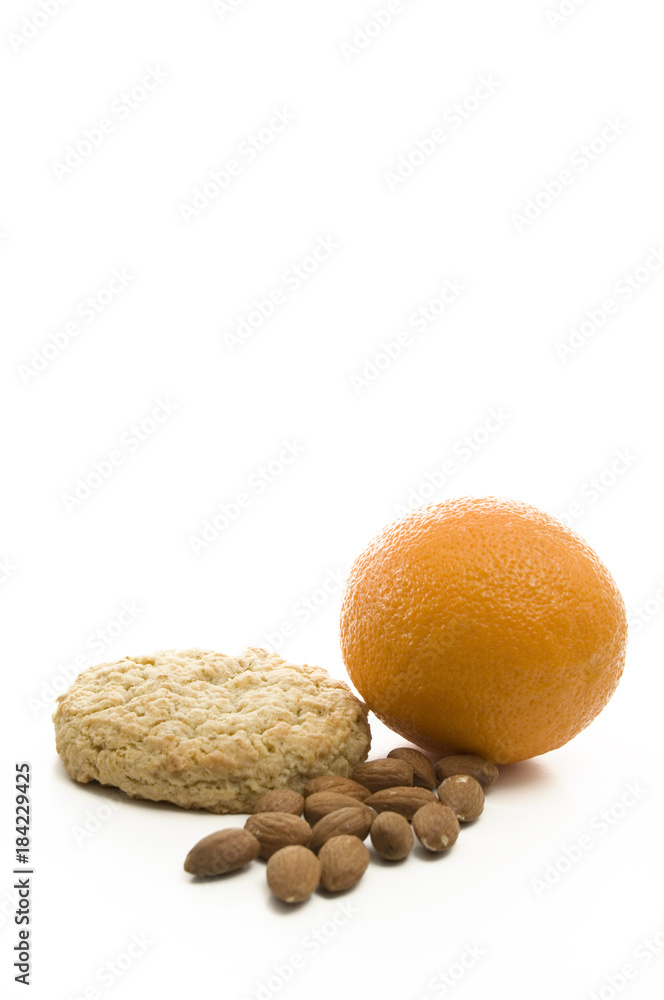 Light Snack of Almonds, Cookie and Orange on White Background Light Snack of Almonds, Cookie and Orange on White Background