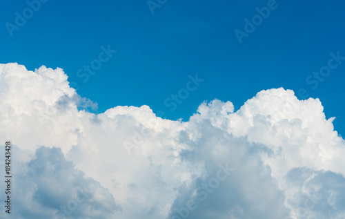 The vast blue sky and cloud sky in landscape view. Blue sky background view with white clouds and copy space. Blue sky concept.