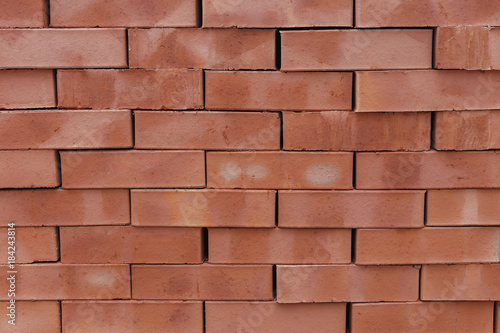 brick wall of bricks of different colours closeup