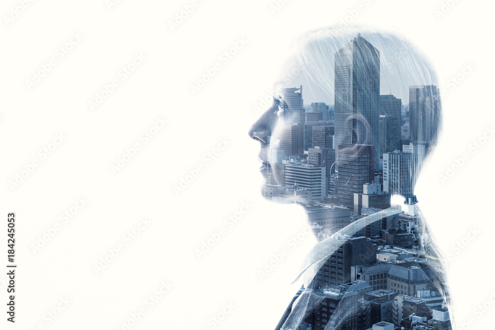 Double exposure of businesswoman and cityscape. Double exposure of businesswoman and cityscape.