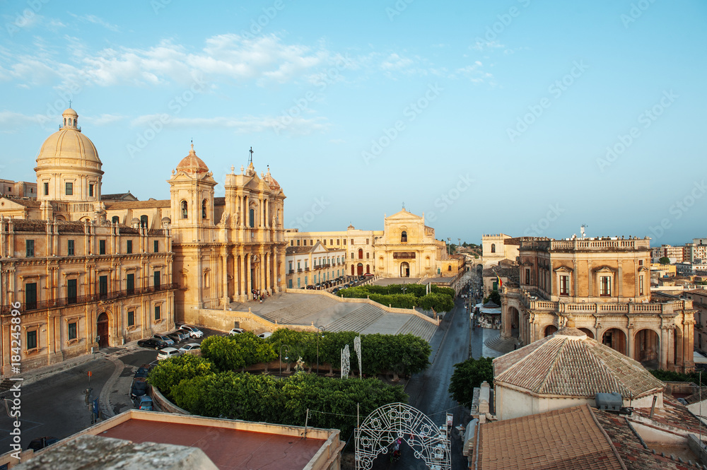 Naklejka premium Noto, Sicily, Italy - view of the baroque cathedral church and the city hall