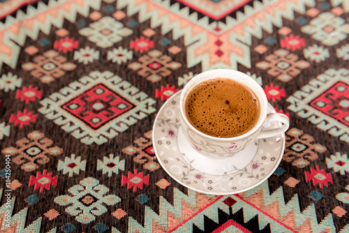 Traditional Turkish coffee on a traditional Turkish rug © epic_images